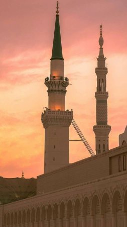 Al masjid an nabawi mosque beatuful sunset cloudy medina saudi arabia скачать фон 1080 x 1920