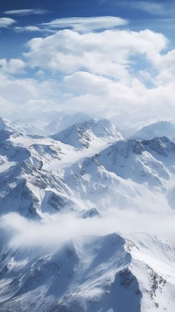 Snow-covered mountains скачать фон 1080 x 1920