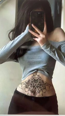 Женские тату на животе