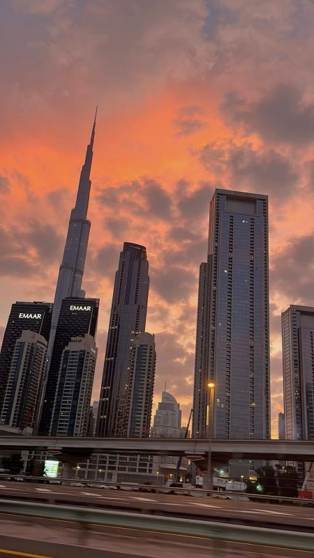 Dubai skyscrapers sunset view скачать фон 1080 x 1920