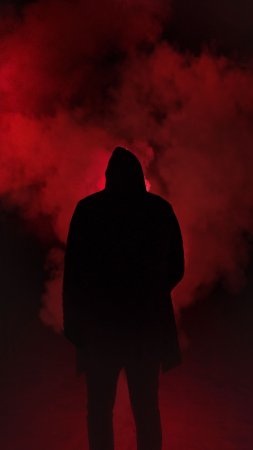 Человек в капюшоне дыму скачать фон 1424 x 2532