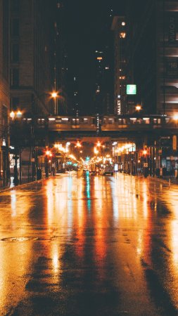 Chicago city street at night in the rain