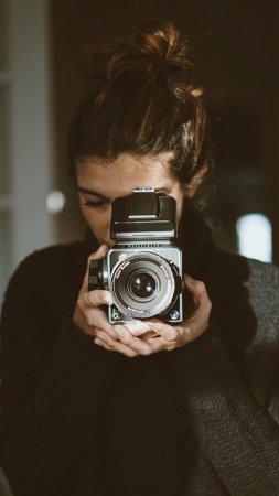 Парень с фотоаппаратом