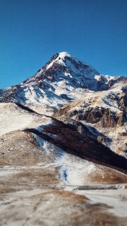 Горы кавказа казбек скачать фон 1424 x 2532