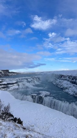 Исландия водопад снег